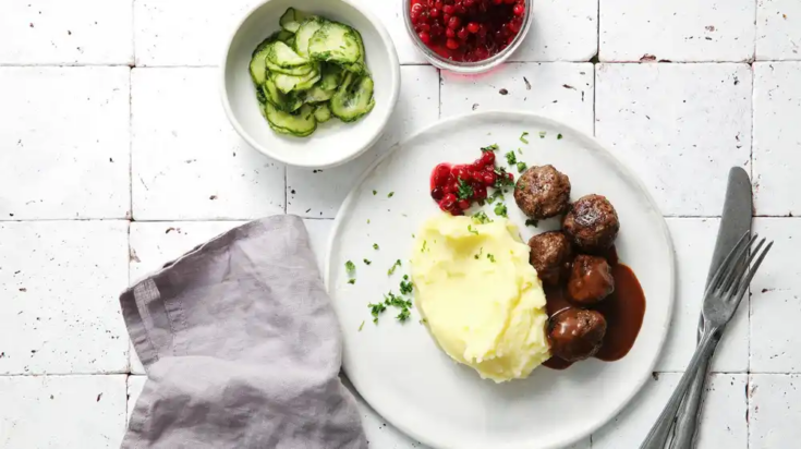 Swedish Meatballs with Mashed Potatoes, Cream Sauce, Pickled Cucumber and Lingonberries (Köttbullar med potatismos, gräddsås, gurka och lingon)